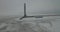 Aerial.Lighthouse in a calm and desolate winter landscape.A view of the lighthouse beacon from above.Drone Lighthouse.