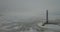 Aerial. Lighthouse in a calm and desolate winter landscape.A view of the lighthouse beacon from above.Drone Lighthouse.