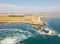 Aerial of the lighthouse on the cliff on the Pacific Ocean in San Francisco, California