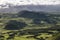 Aerial like landscape from Pico da Urze overlooking the typical gree countryside of Planalto da Achada plains of Ilha do Pico