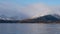 Aerial: Loch Tay in the Scottish Highlands during a clear winters day with snow on Ben Lawers, Scotland