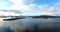 Aerial: Loch Tay in the Scottish Highlands during a clear winters day with snow on Ben Lawers, Scotland