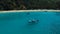 Aerial: Long tail boats on the beautiful beach.