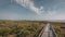 Aerial. A Man Runs on the boardwalk at Smyrna Dunes Park on New Smyrna Beach, Florida