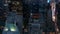 AERIAL: Manhattan Skyline at night with flashing City lights in New York City at Central Park