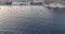 Aerial of many boats and seaside village Agua Amarga on in Cabo de Gata-Nijar natural park, Spain