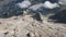 Aerial of the Marmolada mountain and Lake Fedaia in the Dolomites range of northeastern Italy