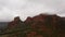 Aerial of massive red rocks in Sedona during cloudy day