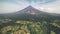 Aerial Mayon Volcano in Legazpi City Albay, Philippine. Camera go dowm, making vertical panorama