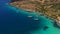 Aerial mediterranean sea landscape with boat, yachts, turquoise clear water and bay coastline