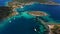 Aerial mediterranean sea landscape with boats, yachts, turquoise clear water, bay coastline and islands