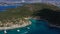 Aerial mediterranean sea landscape with sailing boat, yachts, turquoise clear water and bay coastline