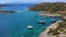 Aerial mediterranean sea landscape with sailing boat, yachts, turquoise clear water and bay coastline