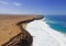 Aerial mid level panoramic view of the rocky cliffs and beaches near El Cotillo in Fuerteventura