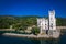 An aerial of the Miramare Castle in the scenic Gulf of Trieste in Italy captured on a bright day