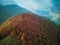 Aerial of Monte Galbiga mountain of Lombardy covered in autumn foliage, fall colors in Italy