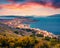 Aerial morning cityscape of Saranda port. Stunning sunrise on Ionian sea.