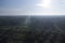 Aerial morning scene of the electric tower at palm oil agriculture farm