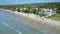 Aerial Motion along Wet Ocean Sand Low Tide Beach