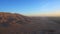 Aerial motion video riding hot air balloon over Luxor Egypt valley of the king Unesco heritage site sunrise