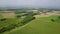 Aerial motion view a large corn field