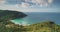 Aerial mountains island lagoon. Ocean view timelapse cloud sunset. Coast paradise beach with boat