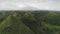 Aerial mountains rainforest view: Asia tropical green hill with jungle at rural Legazpi, Philippines