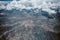 Aerial mountains under clouds map view. Airplane view middle east landscape