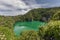 Aerial nature landscape of Thale Nai or Blue Lagoon. Emerald Lake of volcano at Koh Mae Ko island viewpoint in Mu Ko Ang