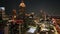 Aerial night footage of Atlanta skyline and highways, cars and builds shot from drone