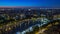 Aerial Night timelapse view of Paris City and Seine river shot on the top of Eiffel Tower