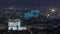 Aerial Night timelapse view of Paris City and Triumphal Arch shot on the top of Eiffel Tower