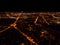 Aerial night view of a big city. Beautiful cityscape panorama at night. Aerial view of buildings an roads with car in the city at
