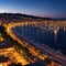 an aerial night view of the picturesque harbor with marina port with cruise tour...