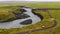 Aerial of an old bridge that leads over the Thjorsa river in Iceland