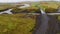 Aerial of an old bridge that leads over the Thjorsa river in Iceland