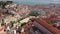 Aerial orbit of Lisbon city center with traditional colorful houses around Martim Moniz square, Lisbon castle on the