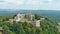 Aerial orbit view of huge ruins of Tenczyn Castle in Rudno, Polish Jura, Poland