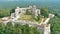 Aerial orbit view of huge ruins of Tenczyn Castle in Rudno, Polish Jura, Poland