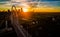 Aerial Over Bridges Solar Flare Sunrise Dallas Texas Dramatic Sunrise Margaret Hunt Hill Bridge and Reunion Tower