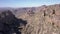 Aerial over dry rocky valley