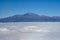 Aerial overcloud view on Tenerife island from airplane