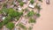 Aerial overhead flooded village and shacks