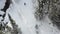 Aerial Overhead of Man Hiking in Snow