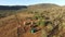 Aerial overhead small African village with mud huts