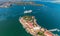 Aerial overhead view of Garden Island in Sydney with leaving cruise ship, Australia