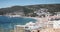 Aerial overview of beaches and beach town center of Sesimbra, Portugal