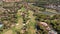 Aerial overview of luxury villas located around Quinta do Lago, Algarve, Portugal, Europe. Drone shot in the green zone.