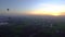 Aerial pan video riding hot air balloon over Luxor Egypt valley of the king Unesco heritage site at sunrise