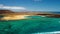 Aerial panning clip of the very tropical looking volcanic island of Lobos Fuerteventura